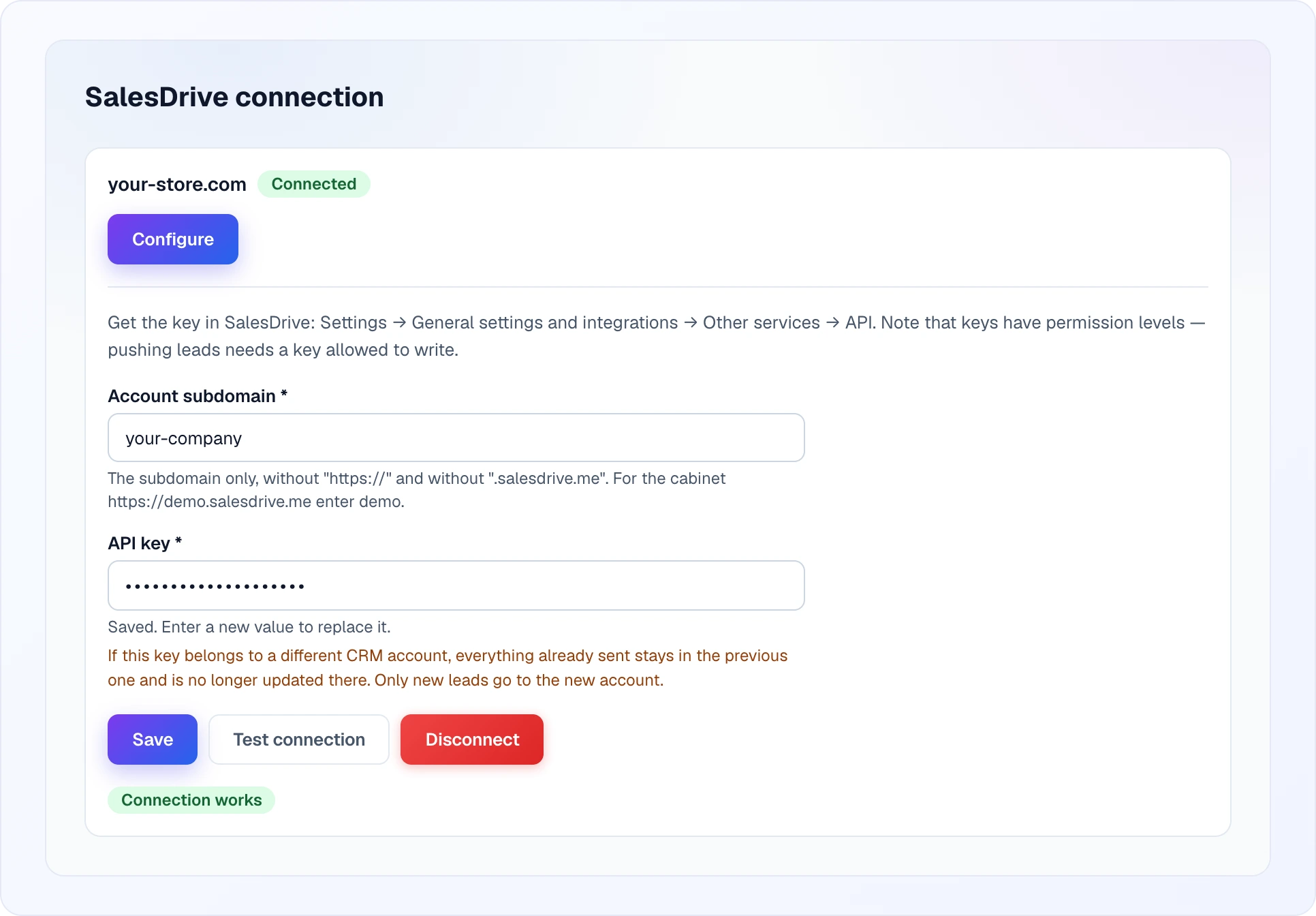 The open connection form of a connected site: the instruction on where to get the key in SalesDrive, the Account subdomain field with its hint, the API key field with the hints "Saved. Enter a new value to replace it." and a warning about switching to another CRM account, the Save, Test connection and Disconnect buttons, and the green Connection works label